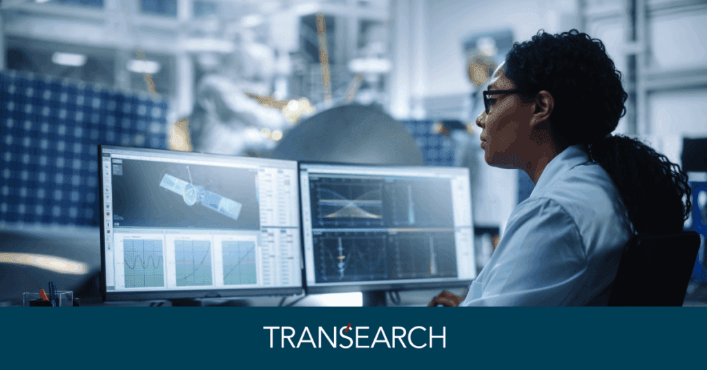 Aerospace recruiting expert using laptop in office