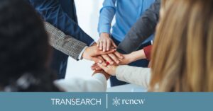 Company team joining hands, showing a culture of collaboration