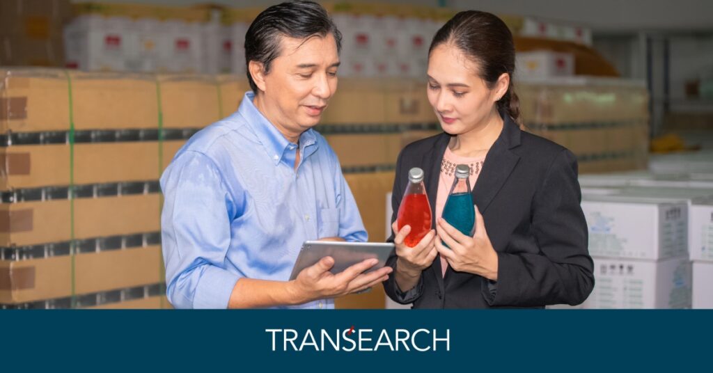 Beverage Excecutive reviewing the product in two bottles.